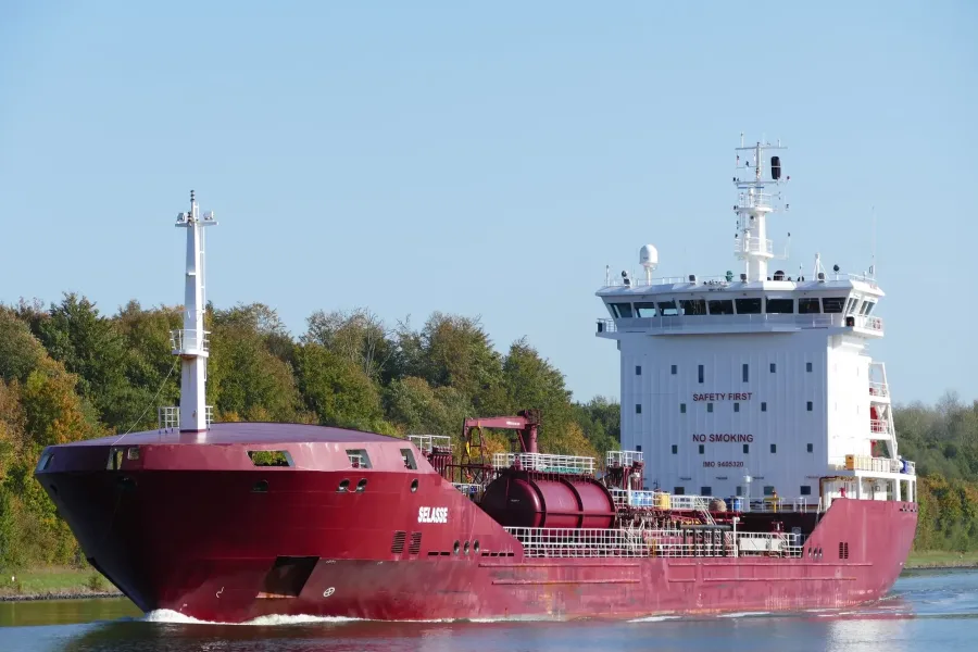 M/T GTM Germany in motion, coated chemical tanker with red antifouling and white structure.
