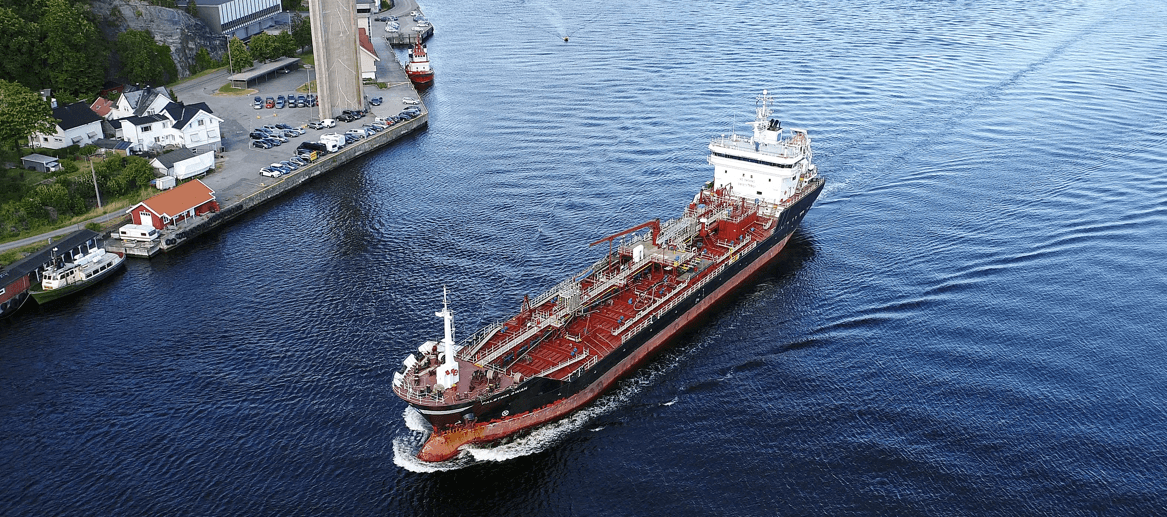 M/T Falstria Swan, 6,882 DWT chemical tanker, bow-starboard view underway — epoxy-coated for safe liquid cargo handling